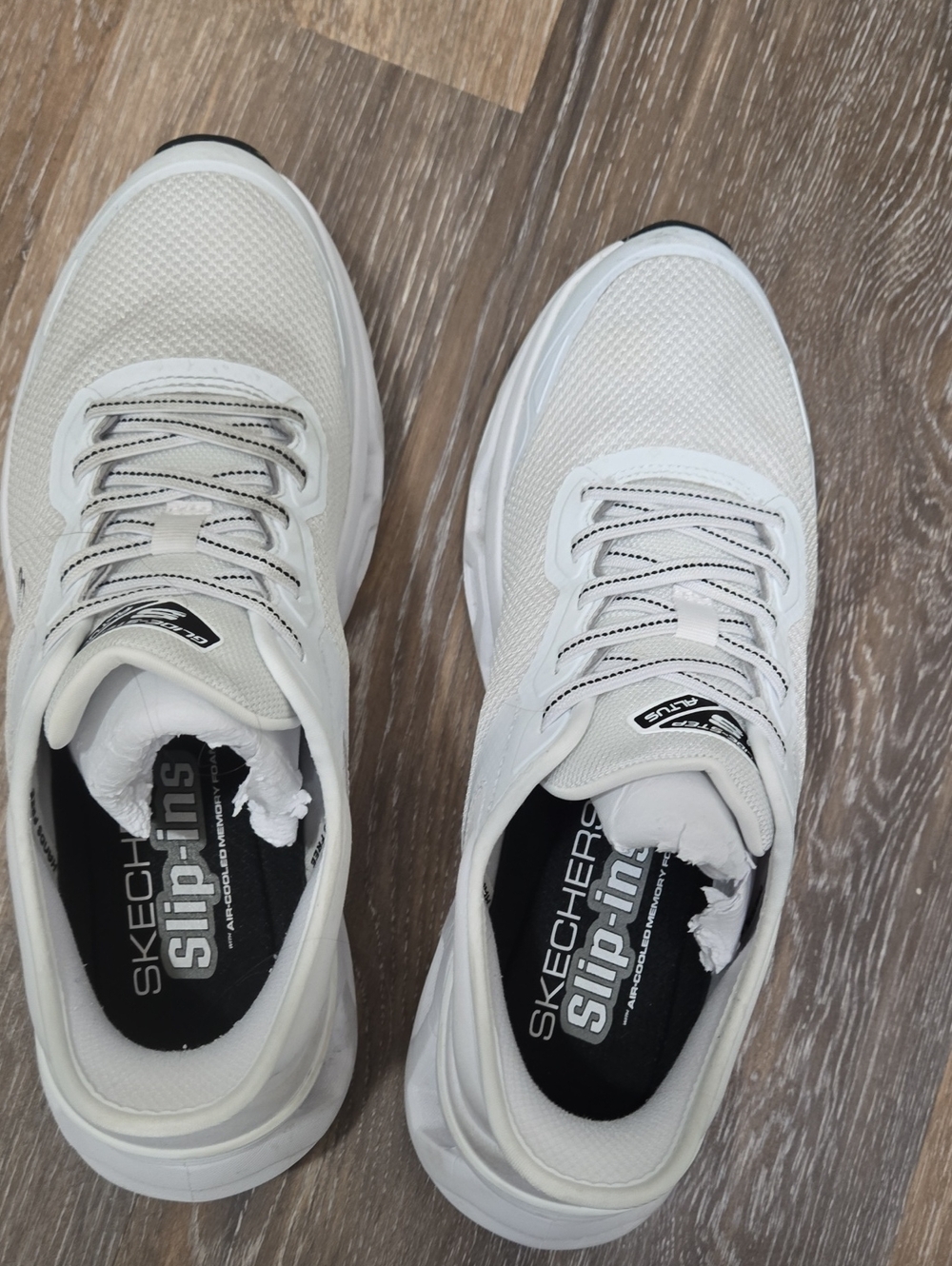 Skechers Men’s White and Black Slip-In Athletic Sneakers